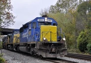 CSX 8803 with its hood front patched.