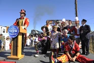 The ringmaster does a ceremony with the circus crew, with 3985 in the background.
