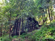 The fire-damaged trestle seen in 2023