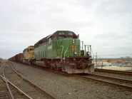 BNSF 8070.jpg (151 KB) BNSF #8070: an "odd-ball" former BN "Cascade Green" painted SD40-2 retaining an odd H1 emblem on the front of the hood.