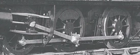The thick diagonal rod shown here is the connecting-rod of a steam locomotive. The horizontal beam that it connects to is that of the coupling-rod.