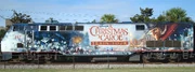 The left sideview of the P42DC unit dressed for Disney's "The Christmas Carol" train tour.