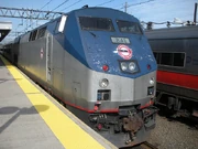 A former Amtrak P40DC with CDOT emblems patched over the unit's scheme.