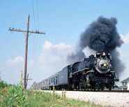 No. 587 burns up the rails near Tipton, IN in June of 1991.