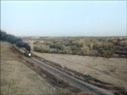 The Union Pacific 844 races through a hill