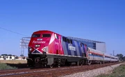 A P42DC being painted in the fictional "Ferromex Zebra" paint scheme.