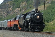 No. 700 and 4449 double-heading a passenger train.