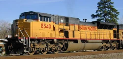 A Union Pacific EMD SD90MAC-H (or a "Phase 2" SD90MAC