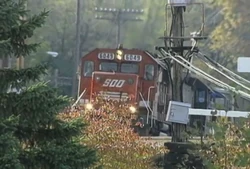 SOO 6062, an , leads a train through Wisconsin