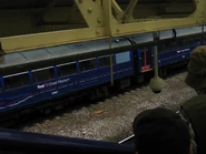 A Pacer Railbus bound for Exmouth sits in platform one of Exeter St Davids