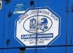 CSX 8803's Juniata Locomotive Shop emblem.