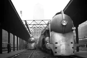 The streamlined steam-powered  departs Chicago's  behind a  locomotive, 1938