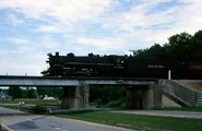 Nickel Plate Road #587 on the "BL line" crosses highway 160 at Lowland, Tn in August 1989.