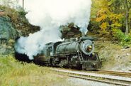 No. 1271 steaming out of a tunnel.