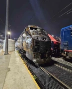 A heavily burned Amtrak #161