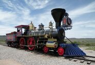 The locomotive sits on display.