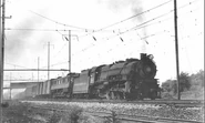 A Pennsylvania Railroad Class L1 helps a Pennsylvania Railroad Class P5 boxcab locomotive with a freight train back in 1941.