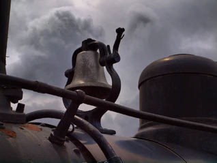 A bell on a steam locomotive.