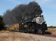 3985 blows a plum of smoke in the air.