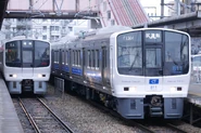 811 series sets PM8 and PM1504 on the Kagoshima Main Line in March 2017.
