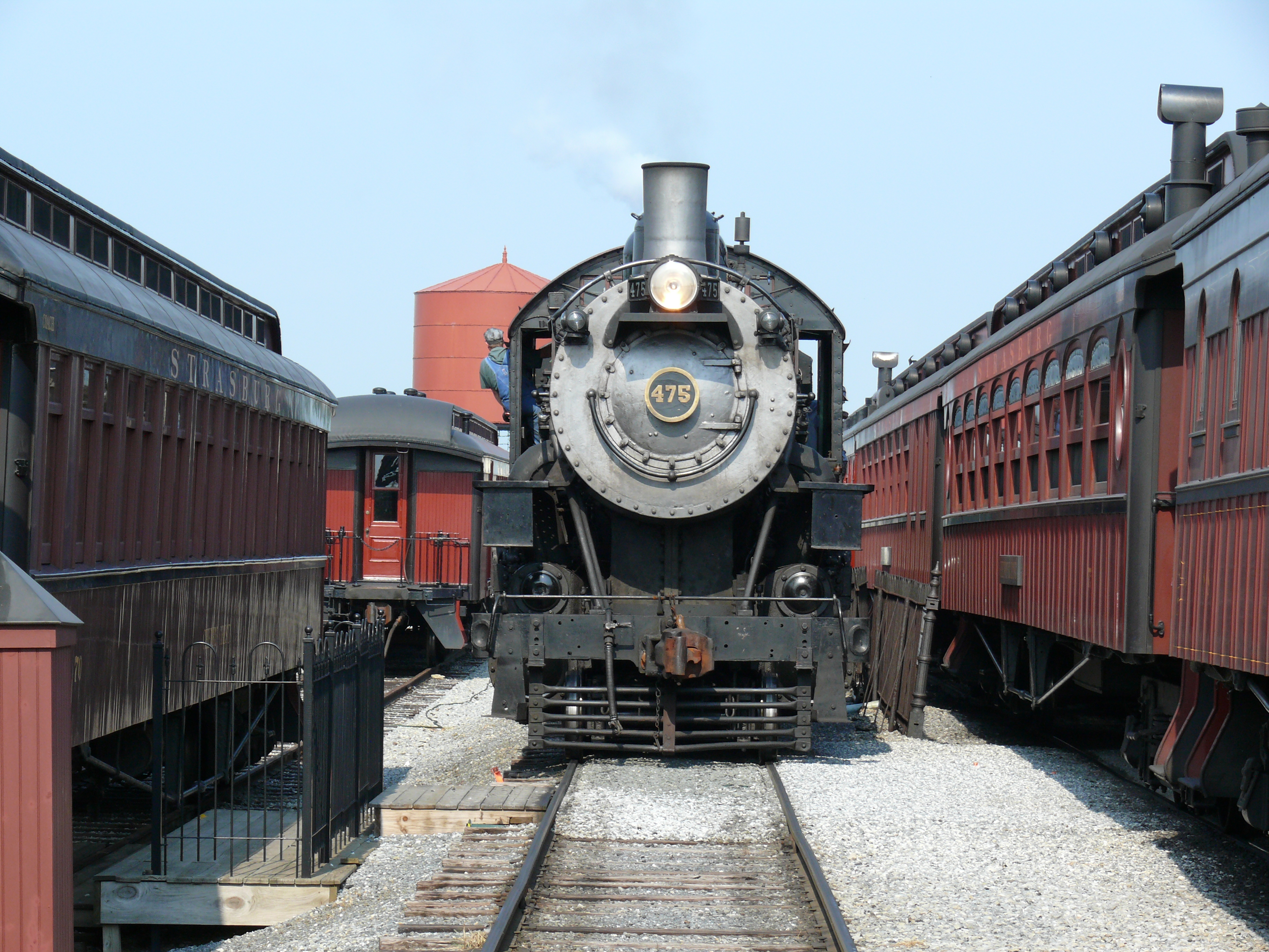 General view of the Strasburg Railroad, Norfolk & Western, 475 steam  locomotive while parked at the station on Monday, June, 29, 2020, in Ronks,  Pennsylvania. The Strasburg Railroad re-opened for passenger service