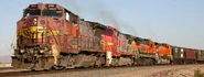BNSF B40-8's.jpg (158 KB) A very worn former ATSF "Warbonnet" B40-8W; known as a "Trash-bonnet" by most railfans.