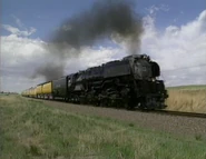 Union Pacific 3985 as sister locomotive 3967 in 1993. Note the additional Smoke Deflectors required; this was a modification for the trip.
