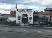 Modern Juniata Locomotive Shop sign viewed from Chestnut Avenue
