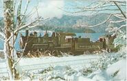 Northern Pacific Railway No. 1070 is pulling a passenger train for the Lake Whatcom Railway at Wickersham during the winter.