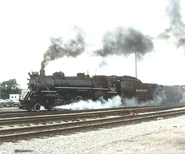 587 in Bellevue, Ohio On June 17, 1989, preparing to double head with Norfolk & Western 611 On The Independence Limited (The Auxiliary Tender Belongs To 611).