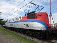A GG1 is on Display at the New York State Fairgrounds in Syracuse NY while painted in the Amtrak paint scheme.