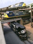 Two CSX C44-8W units meeting a NS "hi-hood" unit in Richmond, Virginia sometime before the two units were eventually converted.