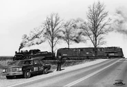 A GG1 is being towed by Canadian National #89.