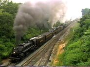 No. 587 is triple headed with N&W 611 & 1218 From Roanoke To Lynchburg VA On July 16, 1989.