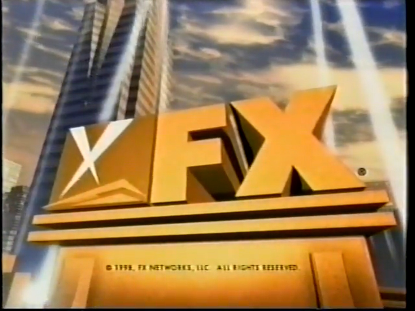 fx logo gold