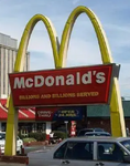 1950s-era sign retrofitted with 1968 wordmark and arches