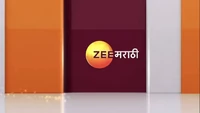 Logo against the purple-and-orange background graphics which were used from 2014 to 23 August 2021.