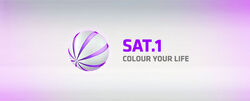 Logo with slogan and Sat.1 wordmark (violet version).