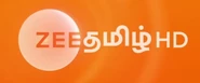 HD logo against orange ripple background.