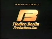 Version with "In Association With" in uppercase letters