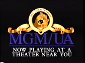 A "Now Playing At A Theater Near You" logo