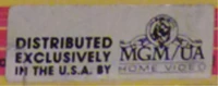 "Distributed exclusively by" print variant, used for Family Home Entertainment and USA Home Video releases from 1982 to 1985.