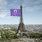 Paralympic emblem as a purple flag (for WeThe15) on the Eiffel Tower with a running blade during the Paris 2024 presentation at the Tokyo 2020 Paralympic Games Closing Ceremony