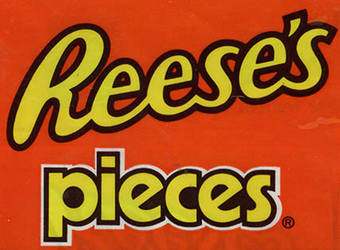 Reese S Pieces Logopedia Fandom Download free reeses pieces png images, one pieces, reeses peanut butter cups, pieces, bits and pieces, triangular pieces, chess pieces, emerald time pieces, reeses, lost missing pieces, reeses pieces clipart. reese s pieces logopedia fandom