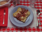 In the episode "I Wish I Were Gus", the logo's plate contains two pieces of ravioli with tomato sauce.