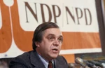 The logo often appeared in orange, notably during the 1980 federal election