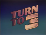 Version of logo, using "Turn to 3" promo campaign.
