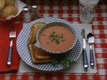 In the episode "Ray's on TV", the logo's plate contains a bowl of tomato soup with grilled cheese.