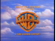 Warner Bros. Television Distribution logo with Time Warner byline used from September 1990 to 1992.