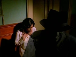 Lois being attacked by Hanson, the Shadow Killer